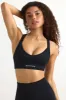 Super Sculpt Seamless Cross-Back Sports Bra in Black sold by Bo + Tee