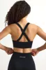 Super Sculpt Seamless Cross-Back Sports Bra in Black sold by Bo + Tee