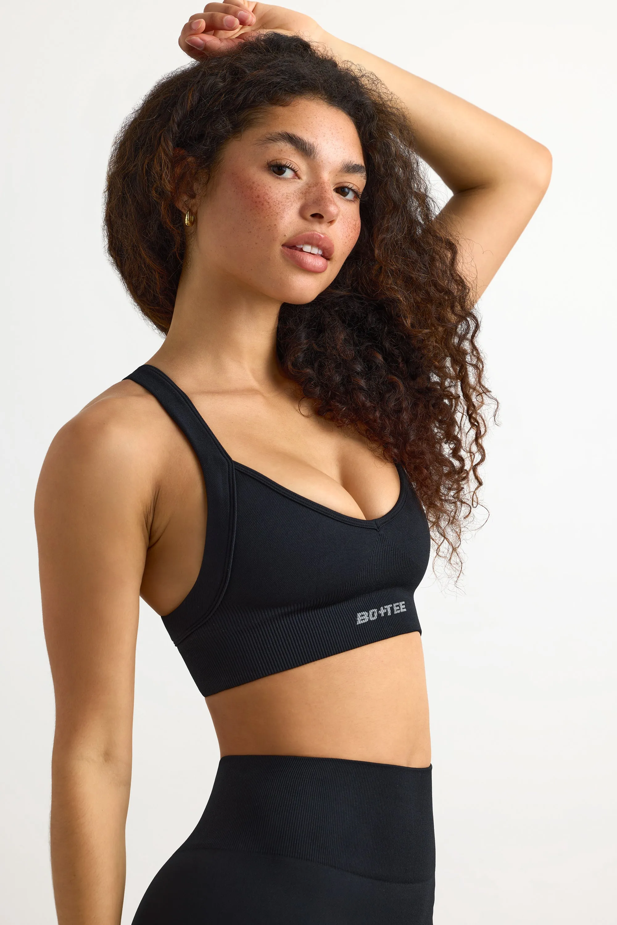 Super Sculpt Seamless Cross-Back Sports Bra in Black sold by Bo + Tee product image thumbnail 2
