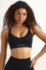 Super Sculpt Seamless Cross-Back Sports Bra in Black sold by Bo + Tee