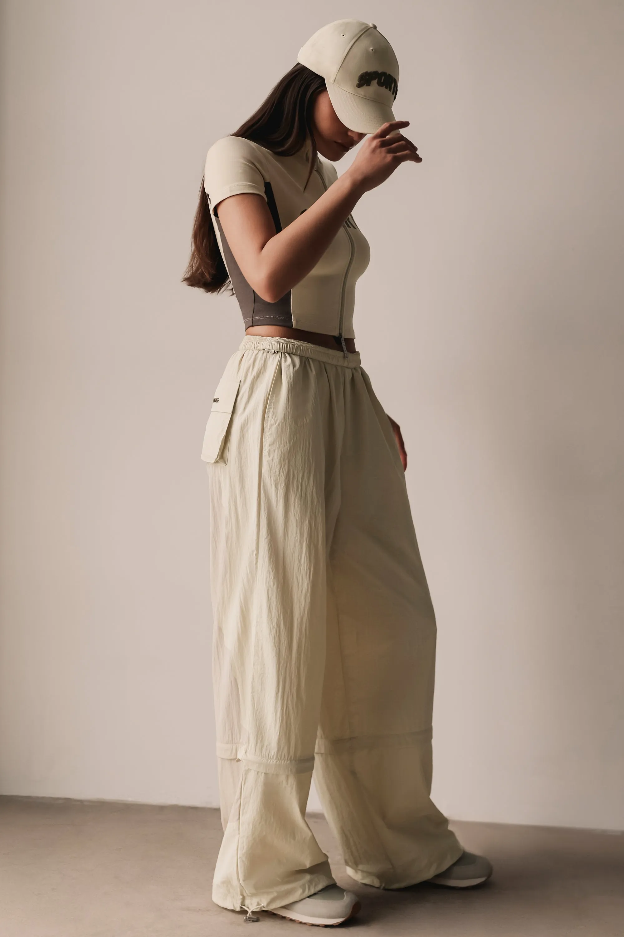 Convertible Wide Leg Track Pants in Bone sold by Bo + Tee