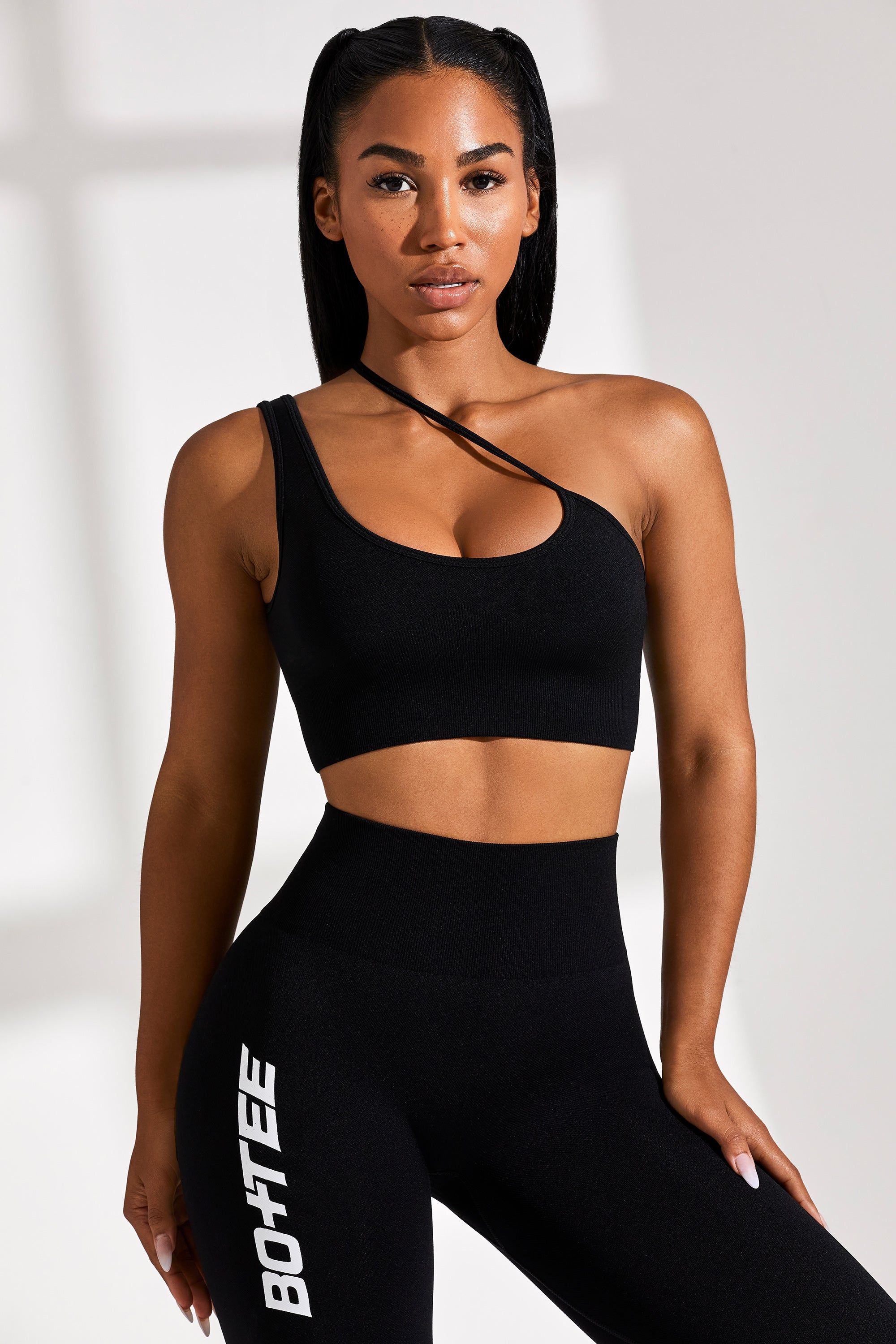 Evolve - Asymmetric Seamless Crop Top in Black sold by Bo + Tee