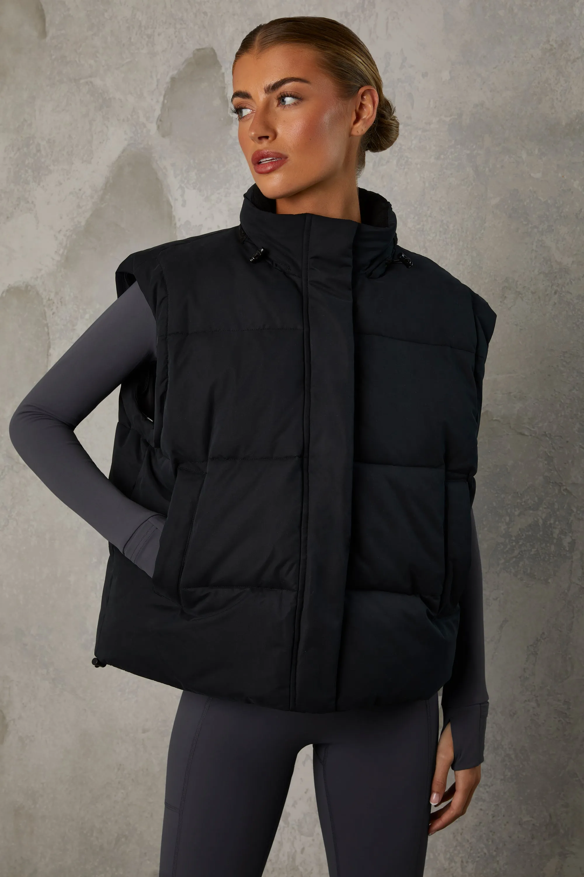 Cropped Puffer Jacket with Detachable Sleeves in Black sold by Bo + Tee product image thumbnail 3