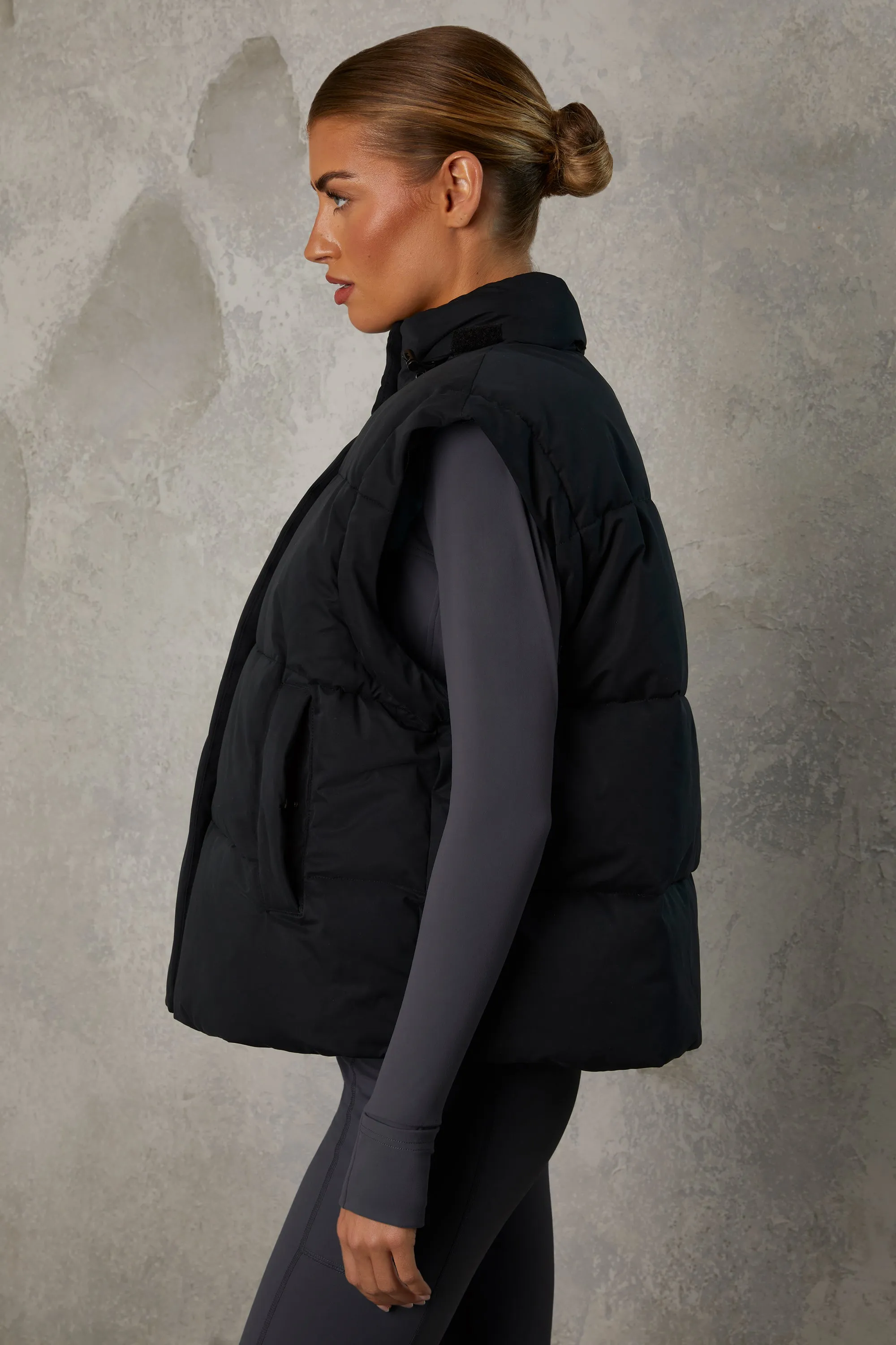 Cropped Puffer Jacket with Detachable Sleeves in Black sold by Bo + Tee product image thumbnail 2