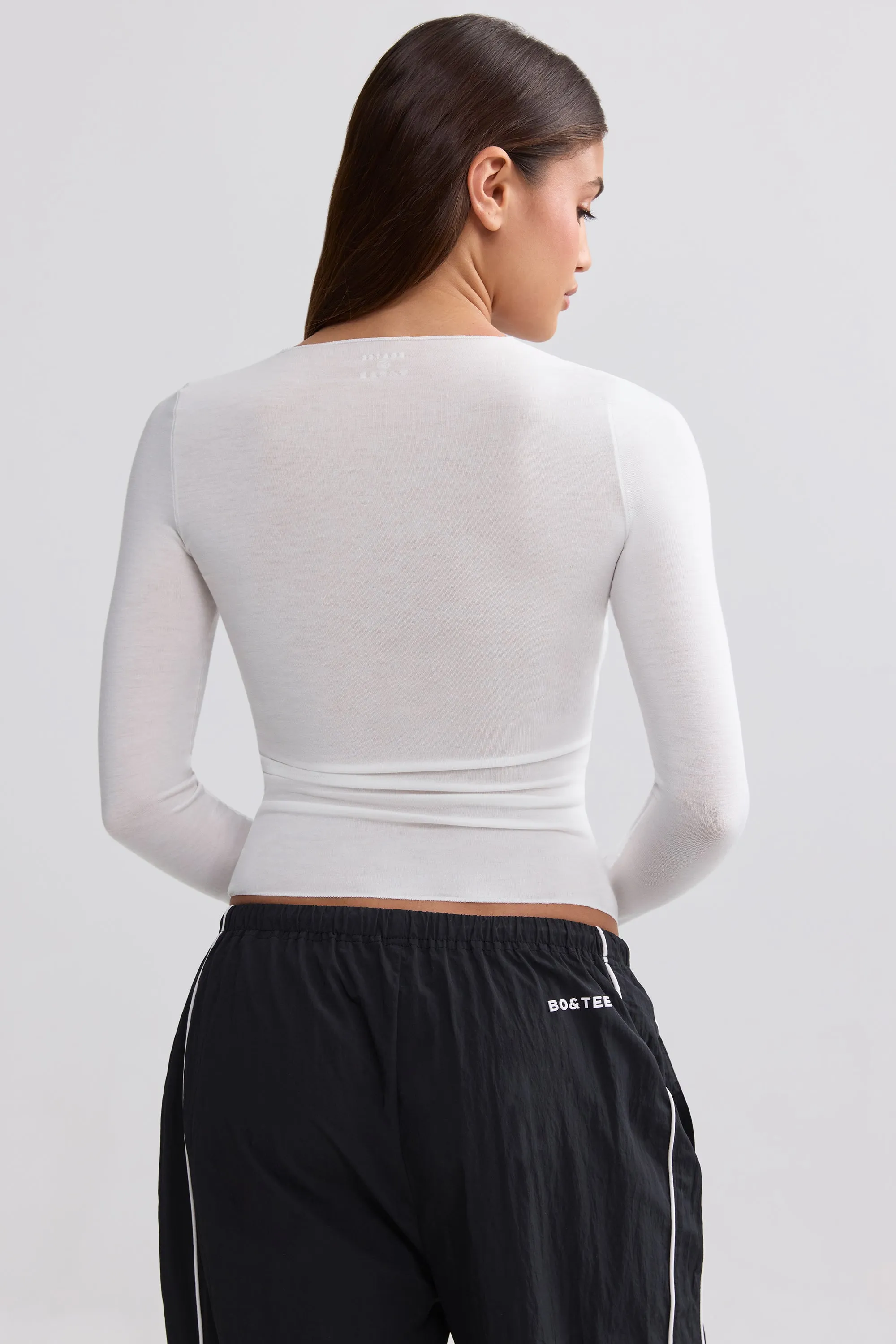 Sheer Long-Sleeve Top in White sold by Bo + Tee product image thumbnail 3
