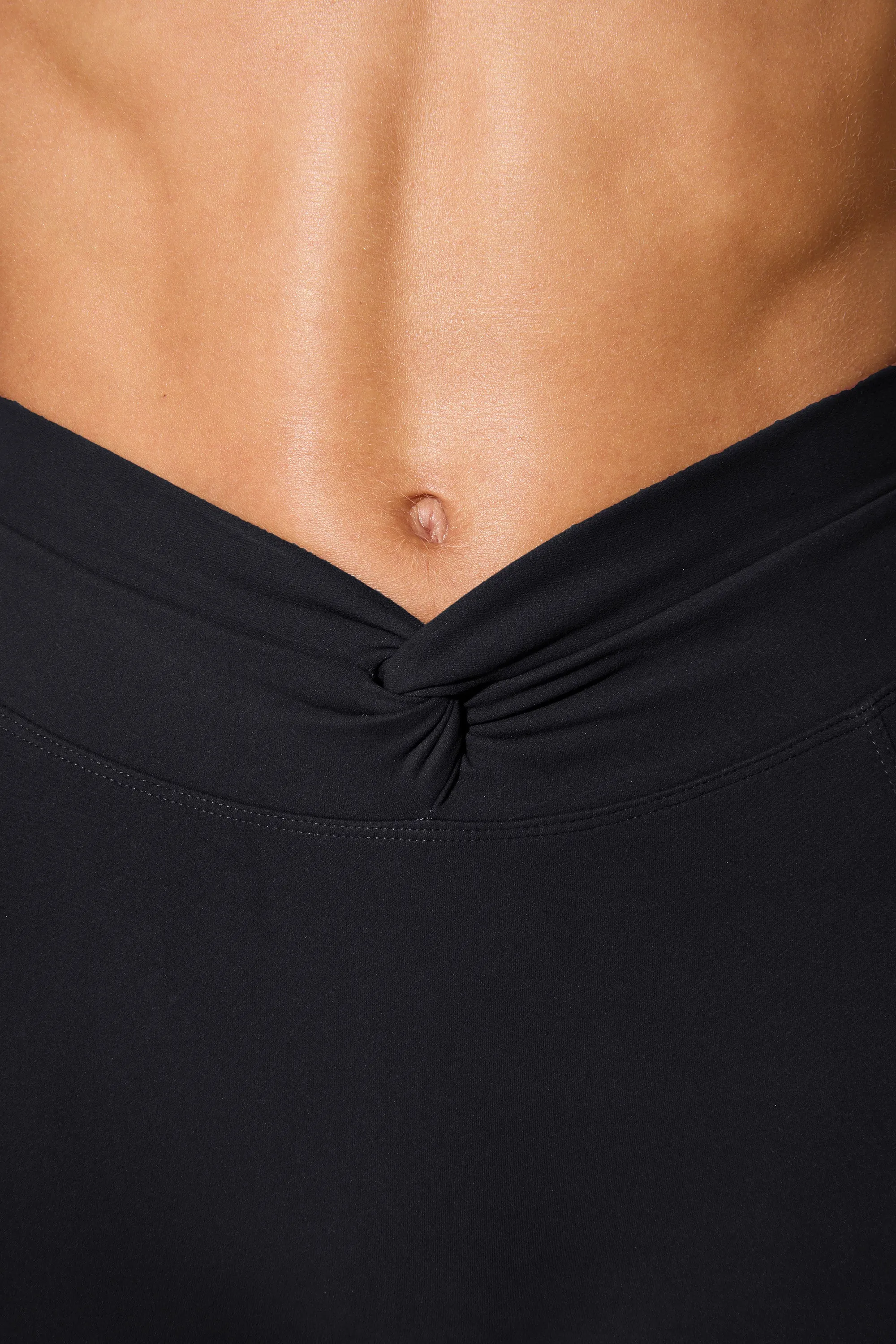 Realign - Petite Twist Waist Flare Leggings in Black sold by Bo + Tee product image thumbnail 4