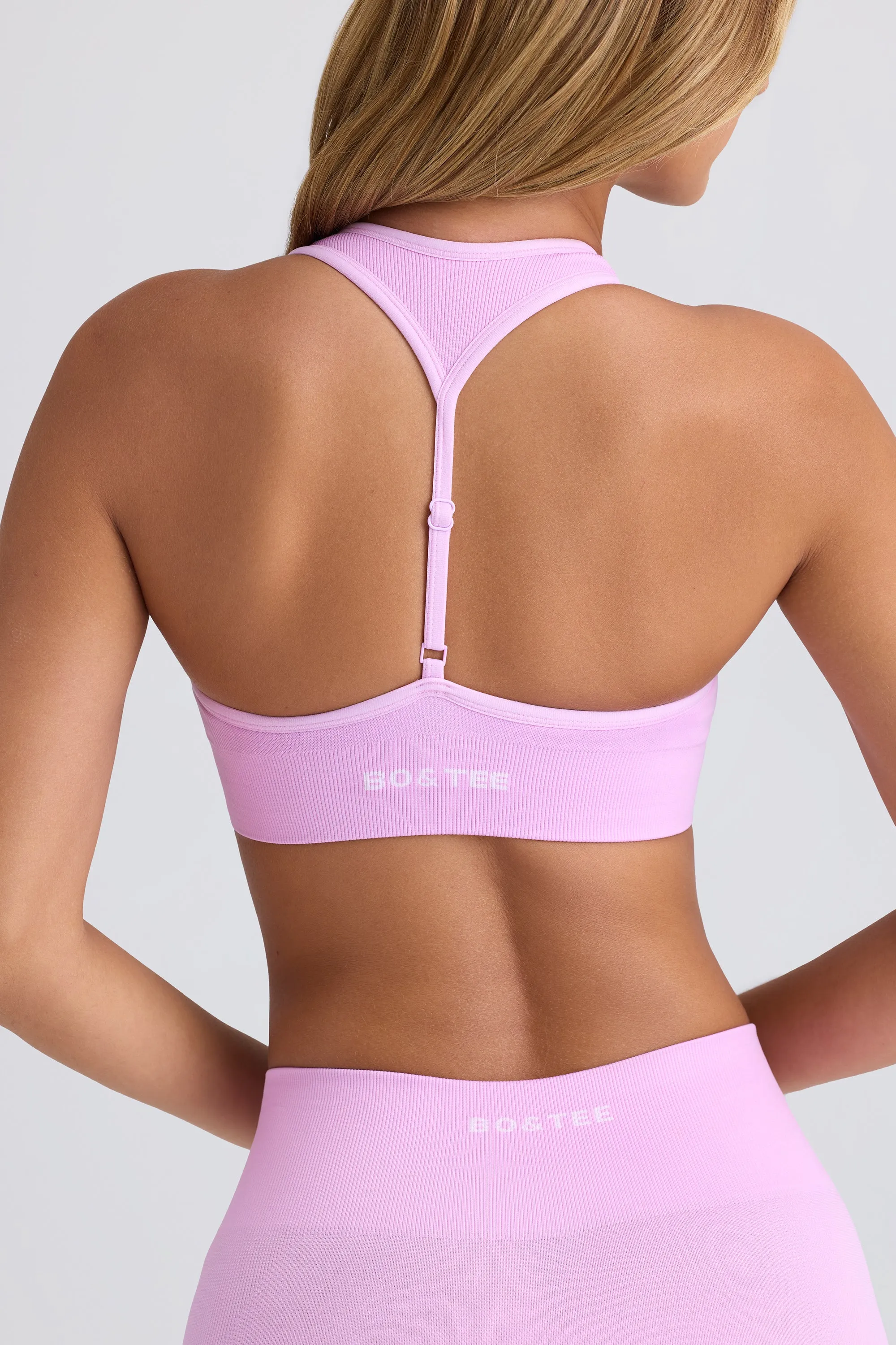 Super Sculpt Seamless T-Back Sports Bra in Violet Pink sold by Bo + Tee product image thumbnail 5