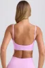 Super Sculpt Seamless Scoop-Back Sports Bra in Violet Pink sold by Bo + Tee