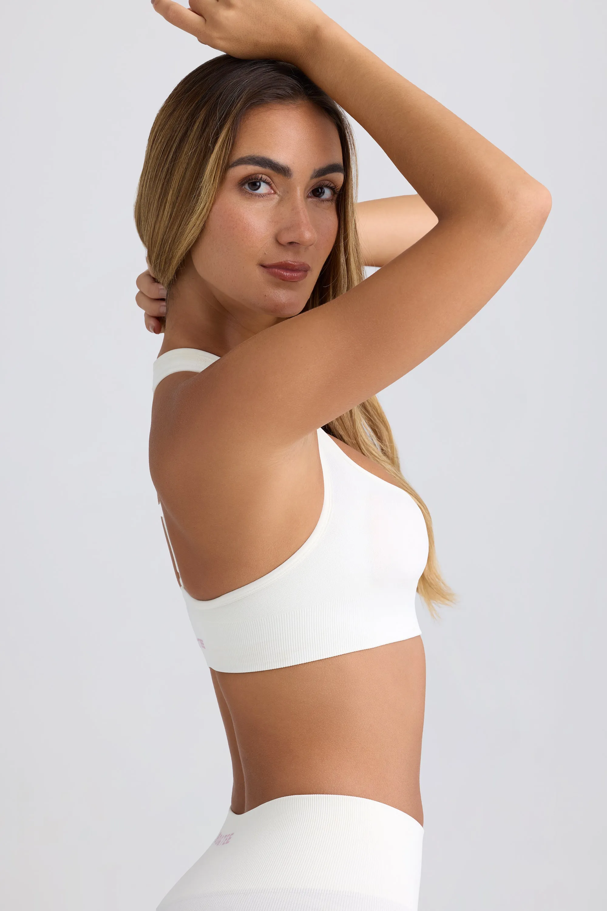 Super Sculpt Seamless T-Back Sports Bra in Eggshell sold by Bo + Tee product image thumbnail 2
