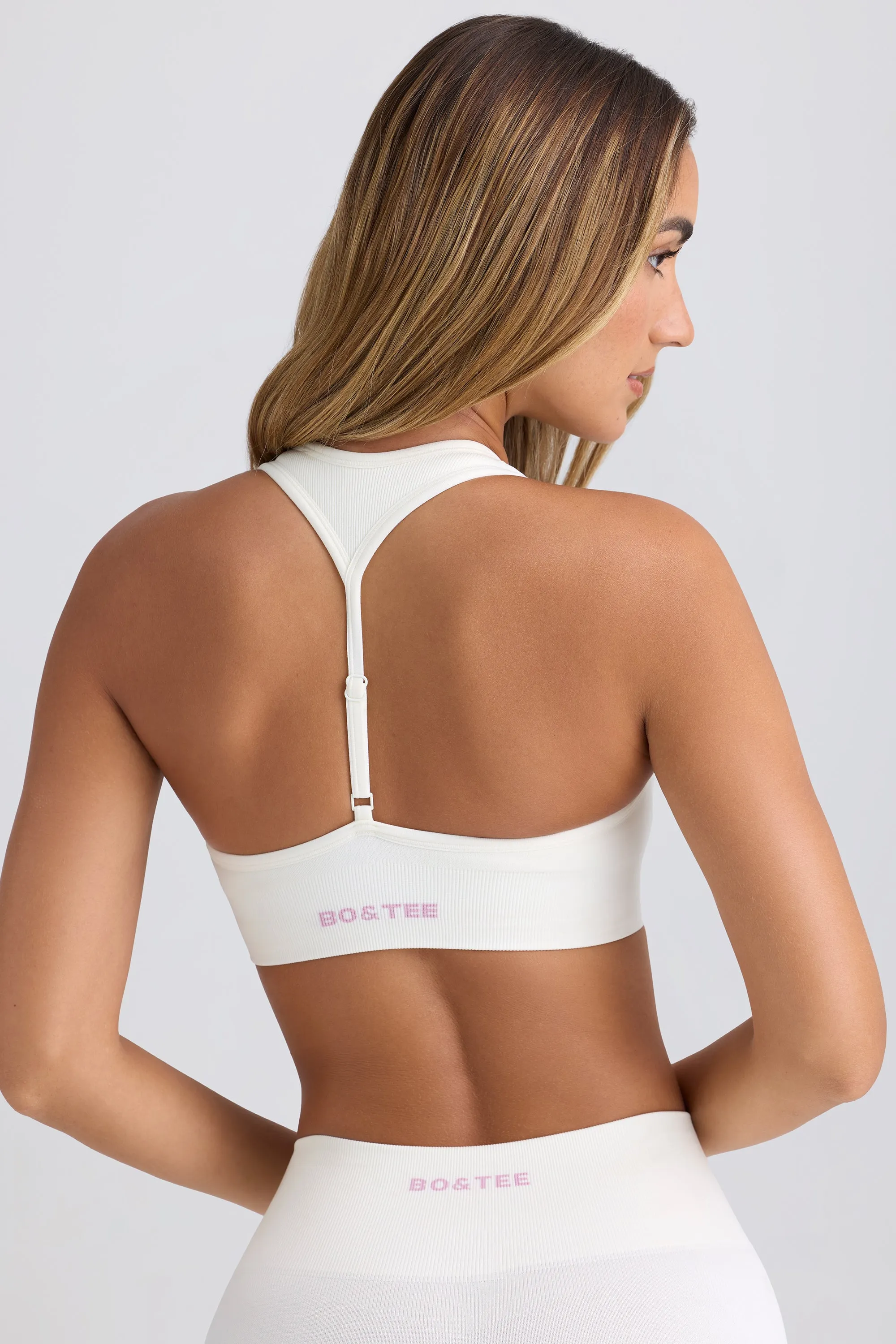 Super Sculpt Seamless T-Back Sports Bra in Eggshell sold by Bo + Tee product image thumbnail 4
