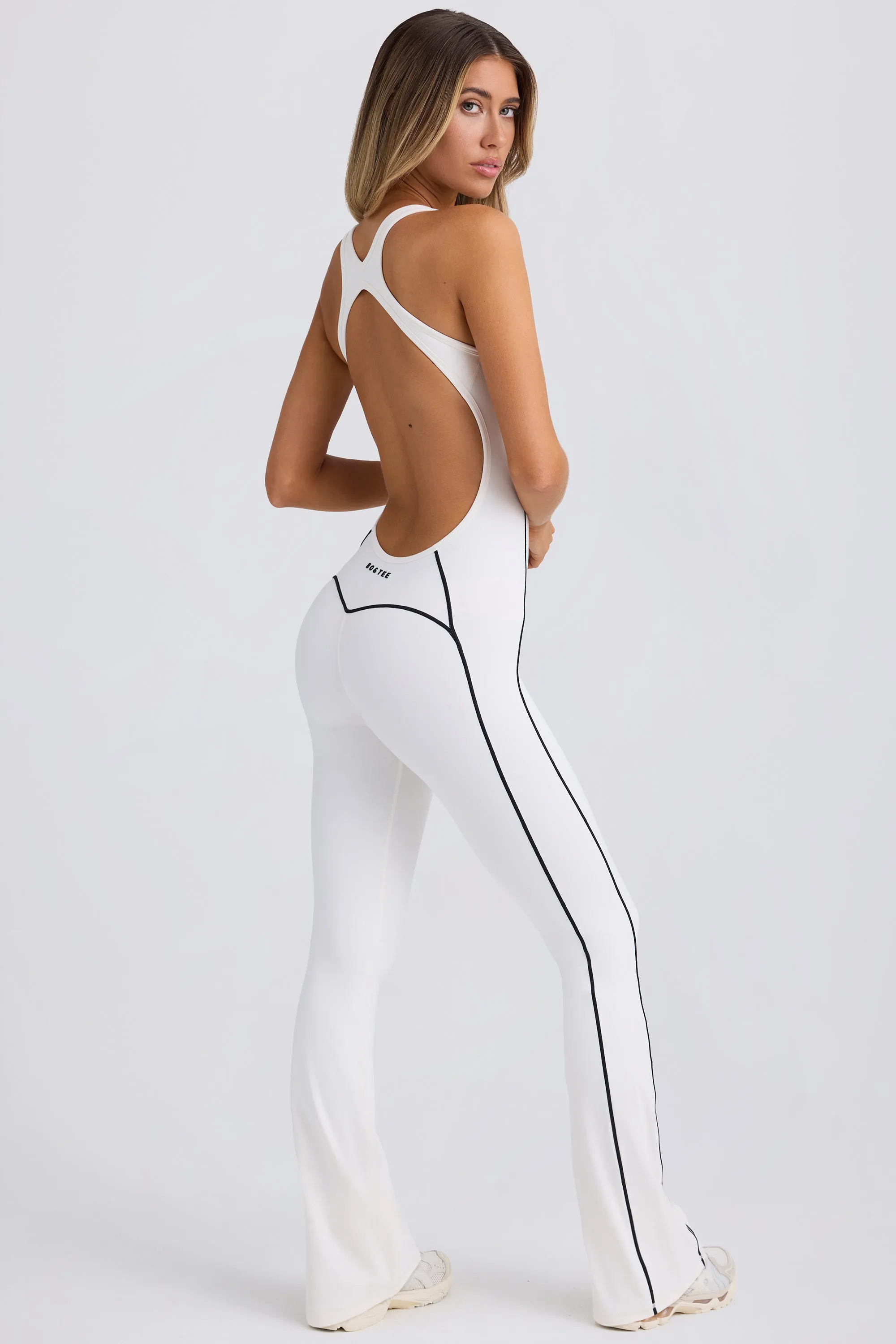 Petite Soft Active Open-Back Jumpsuit in White sold by Bo + Tee
