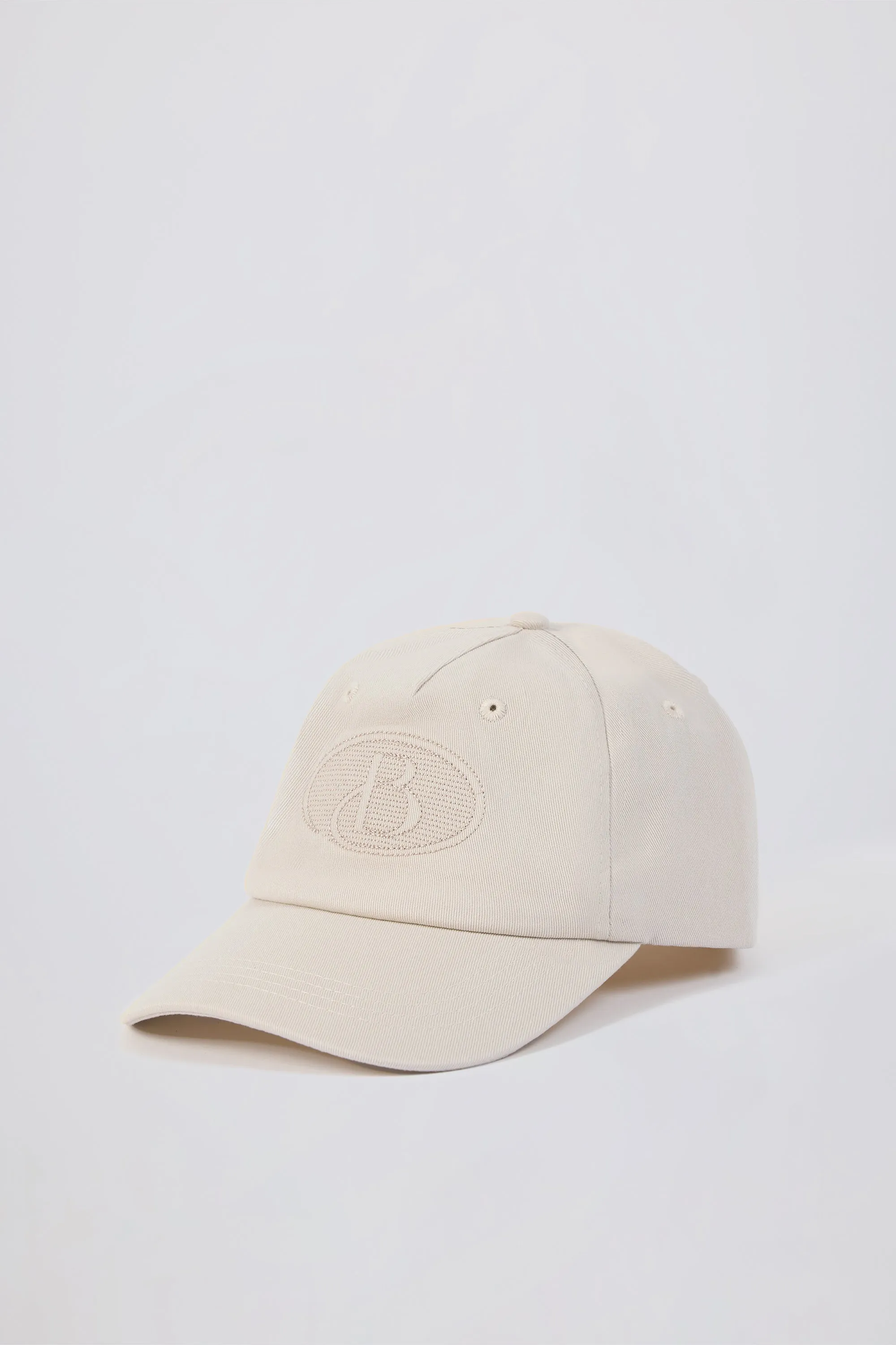 Baseball Cap in Washed Cream sold by Bo + Tee