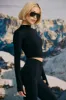 Super Sculpt Seamless Base Layer Top in Black sold by Bo + Tee