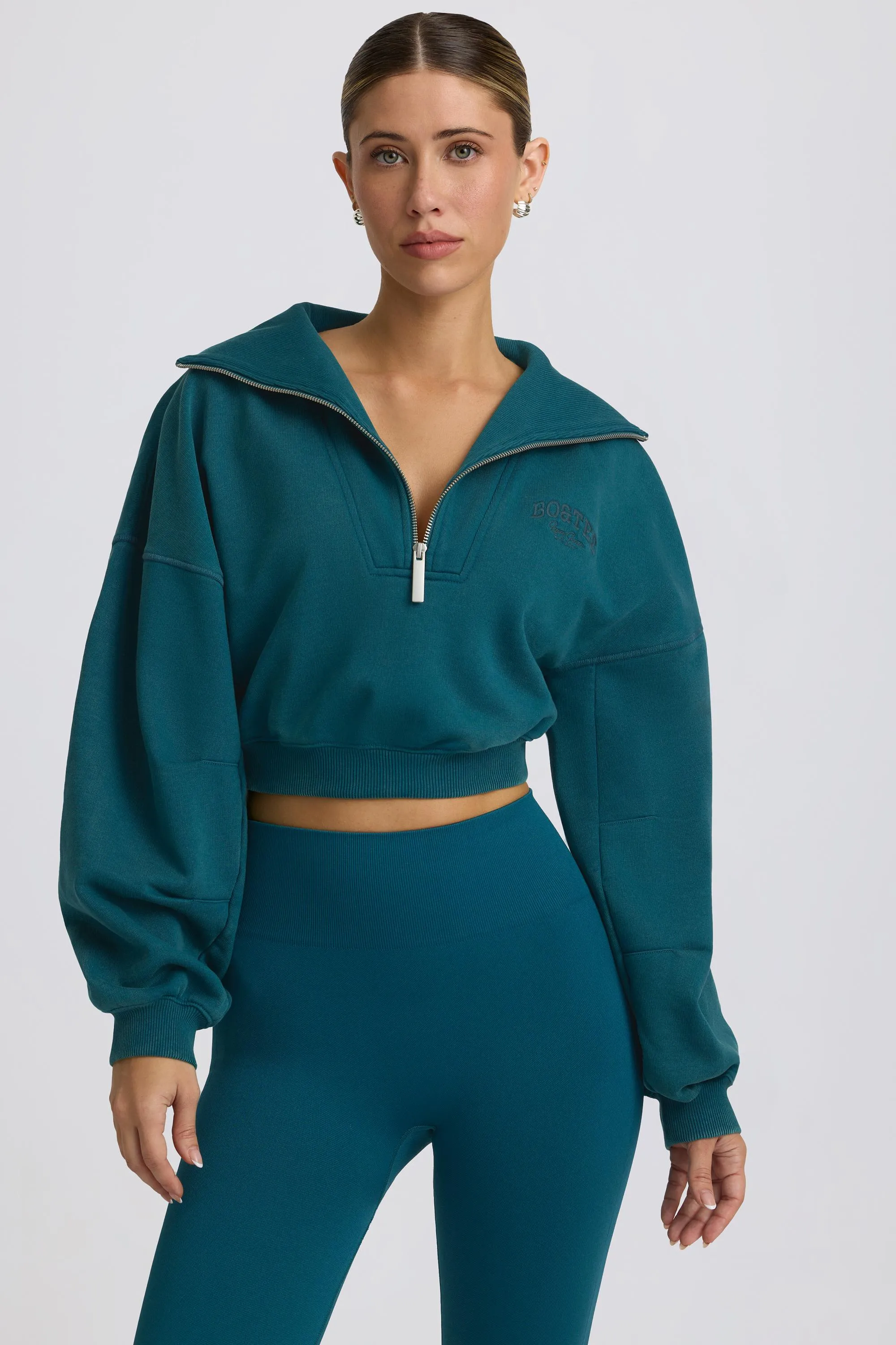 Quarter-Zip Cropped Sweatshirt in Teal sold by Bo + Tee
