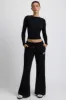 Low-Rise Wide-Leg Joggers in Black sold by Bo + Tee