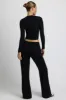 Low-Rise Wide-Leg Joggers in Black sold by Bo + Tee