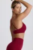 Super Sculpt Seamless Cross-Back Sports Bra in Burgundy sold by Bo + Tee