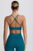 Super Sculpt Seamless Cross-Back Sports Bra in Teal sold by Bo + Tee