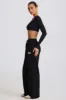 Mid-Rise Wide-Leg Joggers in Black sold by Bo + Tee