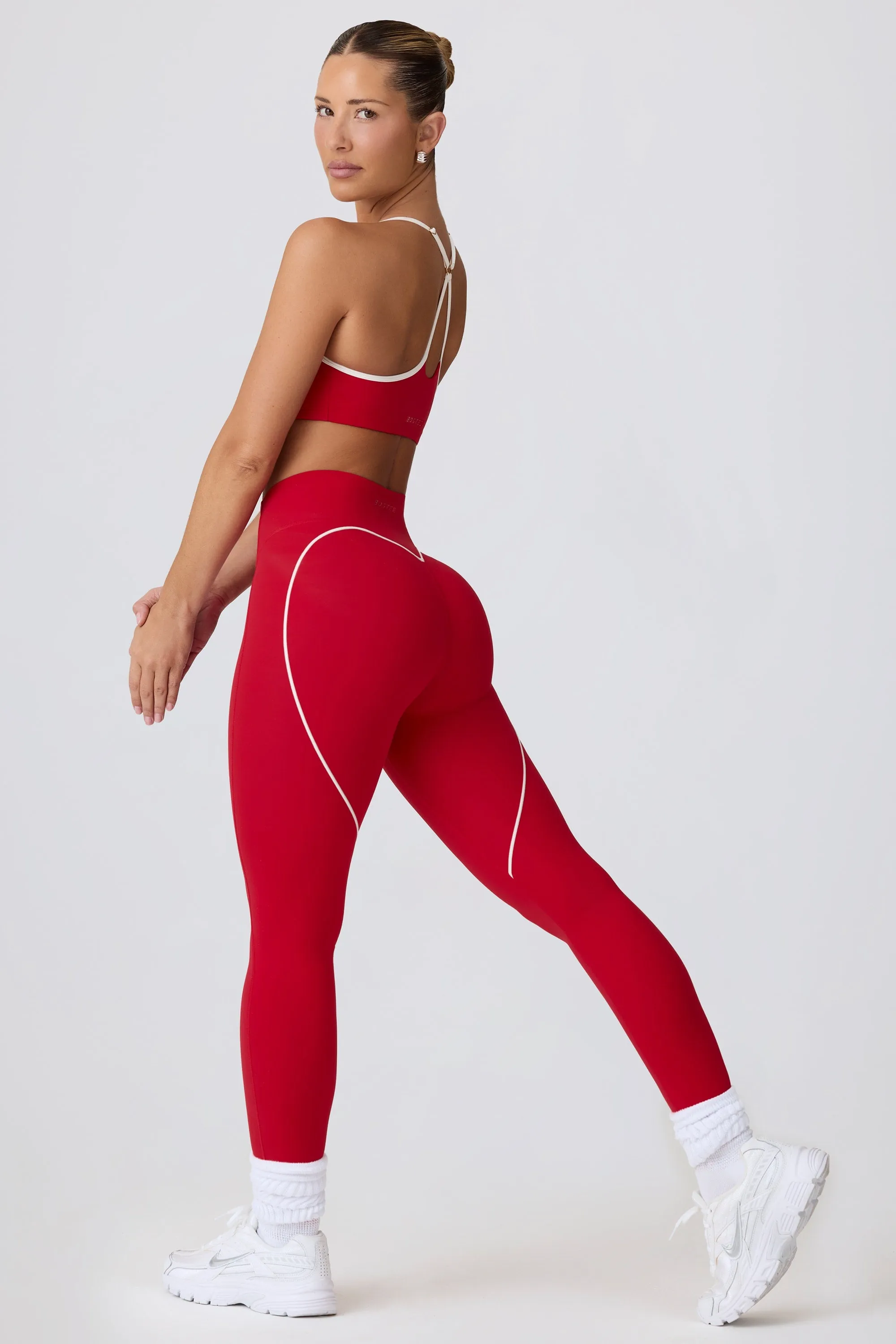 Soft Active Mid-Rise Leggings in Hot Red sold by Bo + Tee