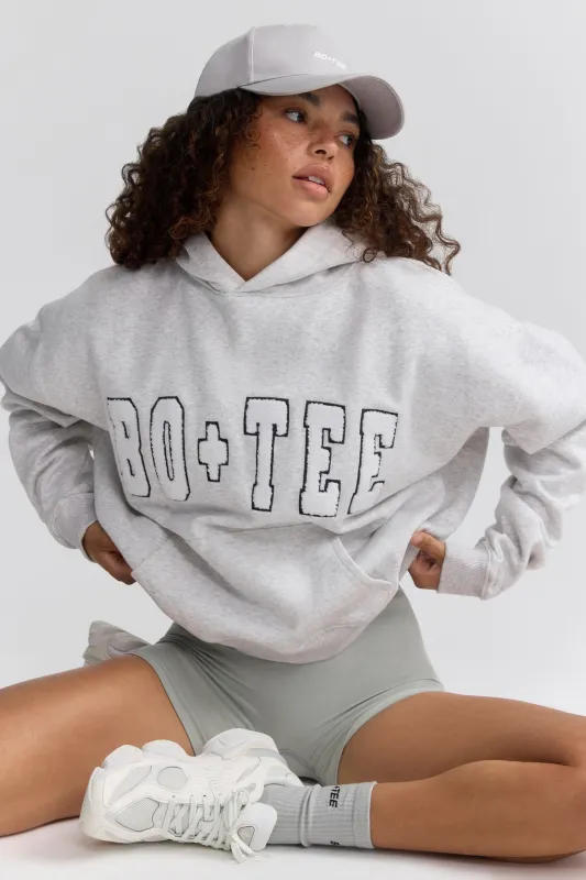 Appliqué Oversized Hoodie in Heather Grey sold by Bo + Tee