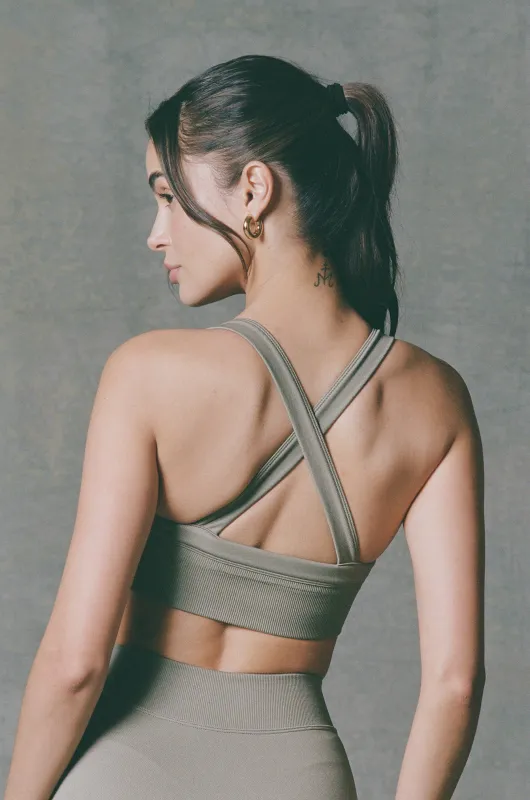 Super Sculpt Seamless Cross-Back Sports Bra in Light Green sold by Bo + Tee