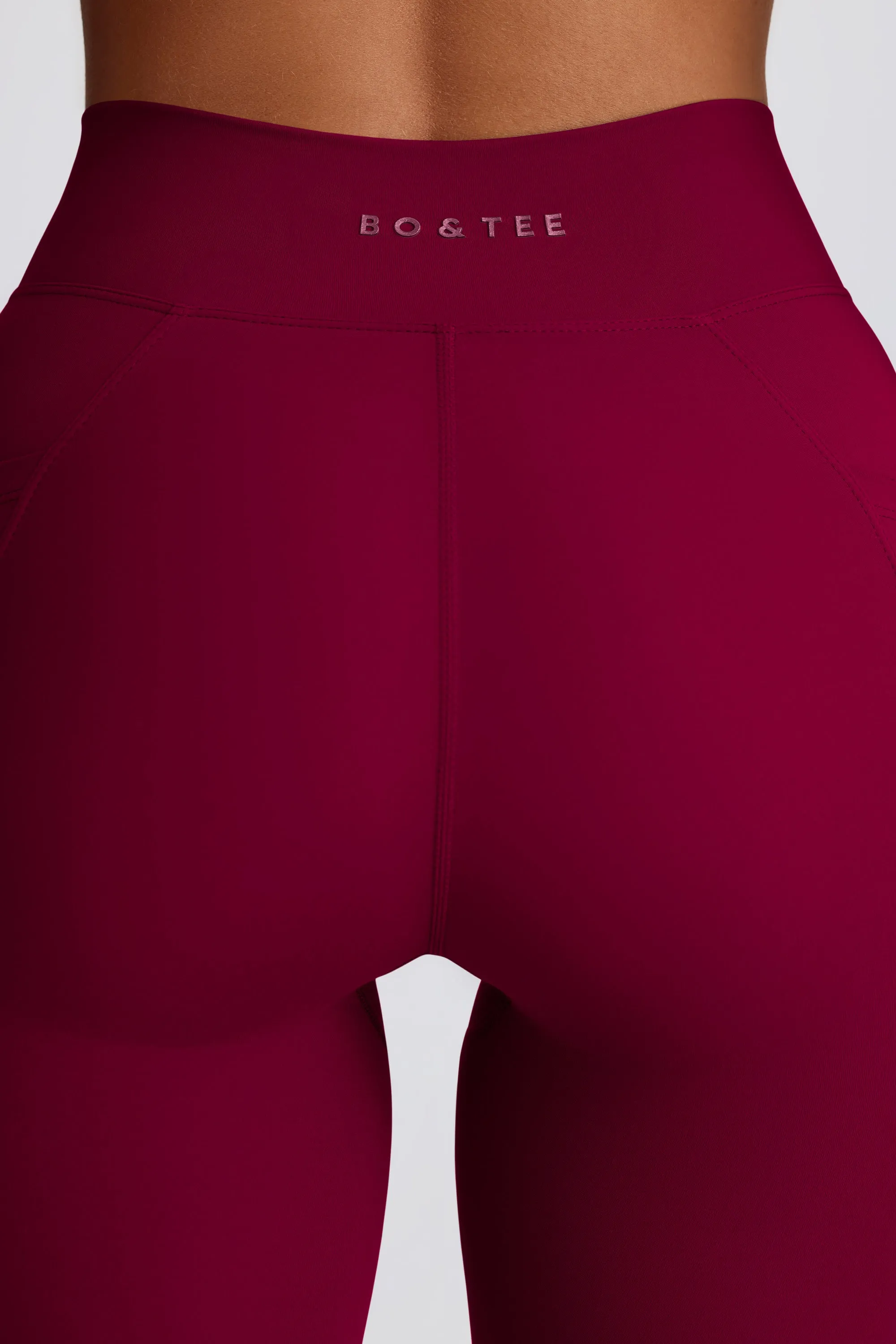 Soft Active V-Waist Pocket Flared Leggings in Burgundy sold by Bo + Tee product image thumbnail 5