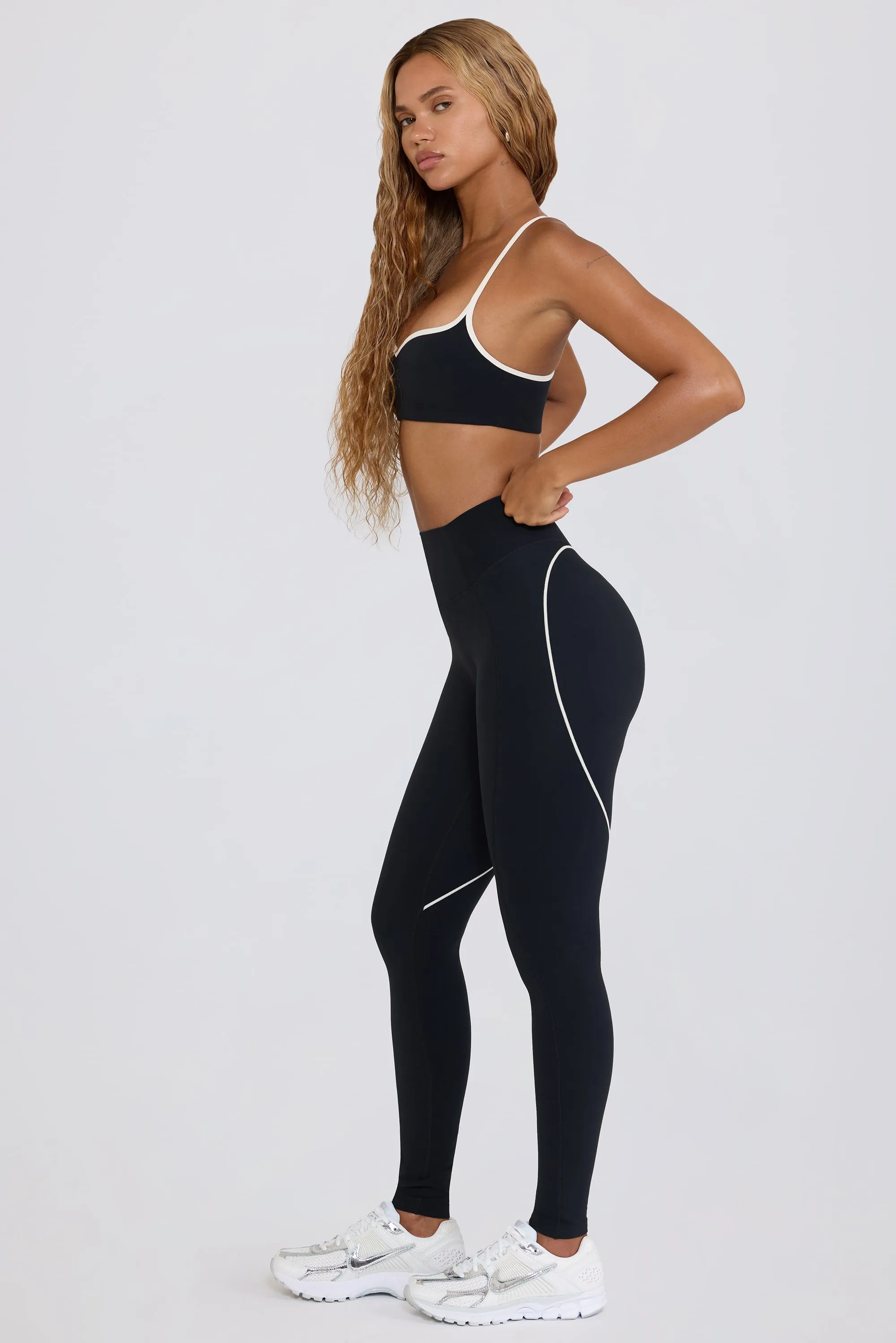 Soft Active Mid-Rise Leggings in Black sold by Bo + Tee product image thumbnail 3