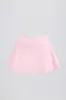 Crossover Mini Skort in Pale Pink Marl sold by Bo + Tee