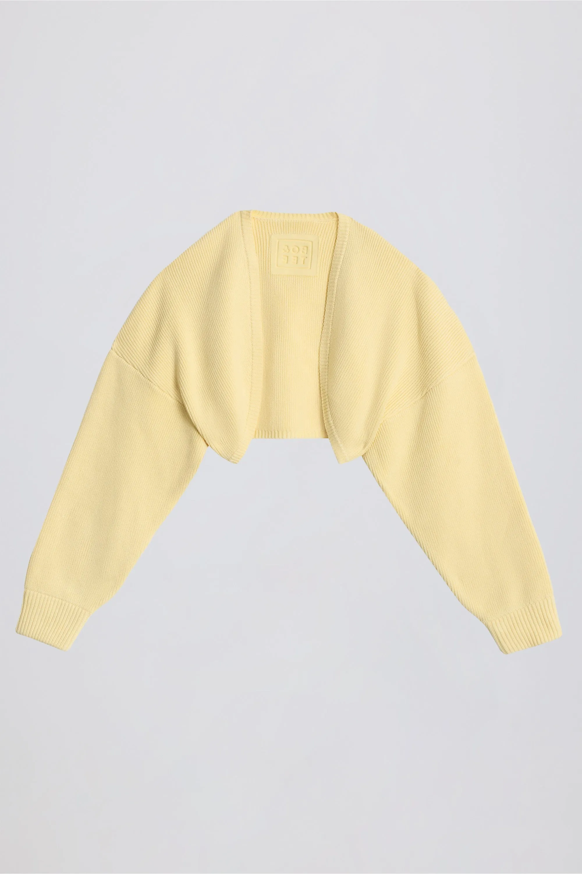 Ribbed-Knit Cropped Shrug in Lemon sold by Bo + Tee