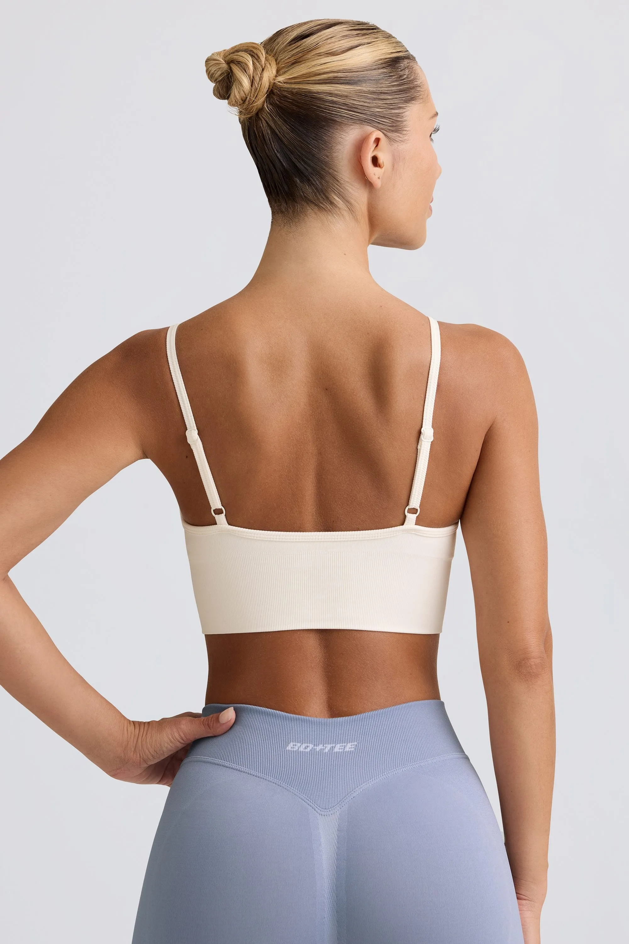 Define Luxe V-Neck Sports Bra in White sold by Bo + Tee product image thumbnail 2