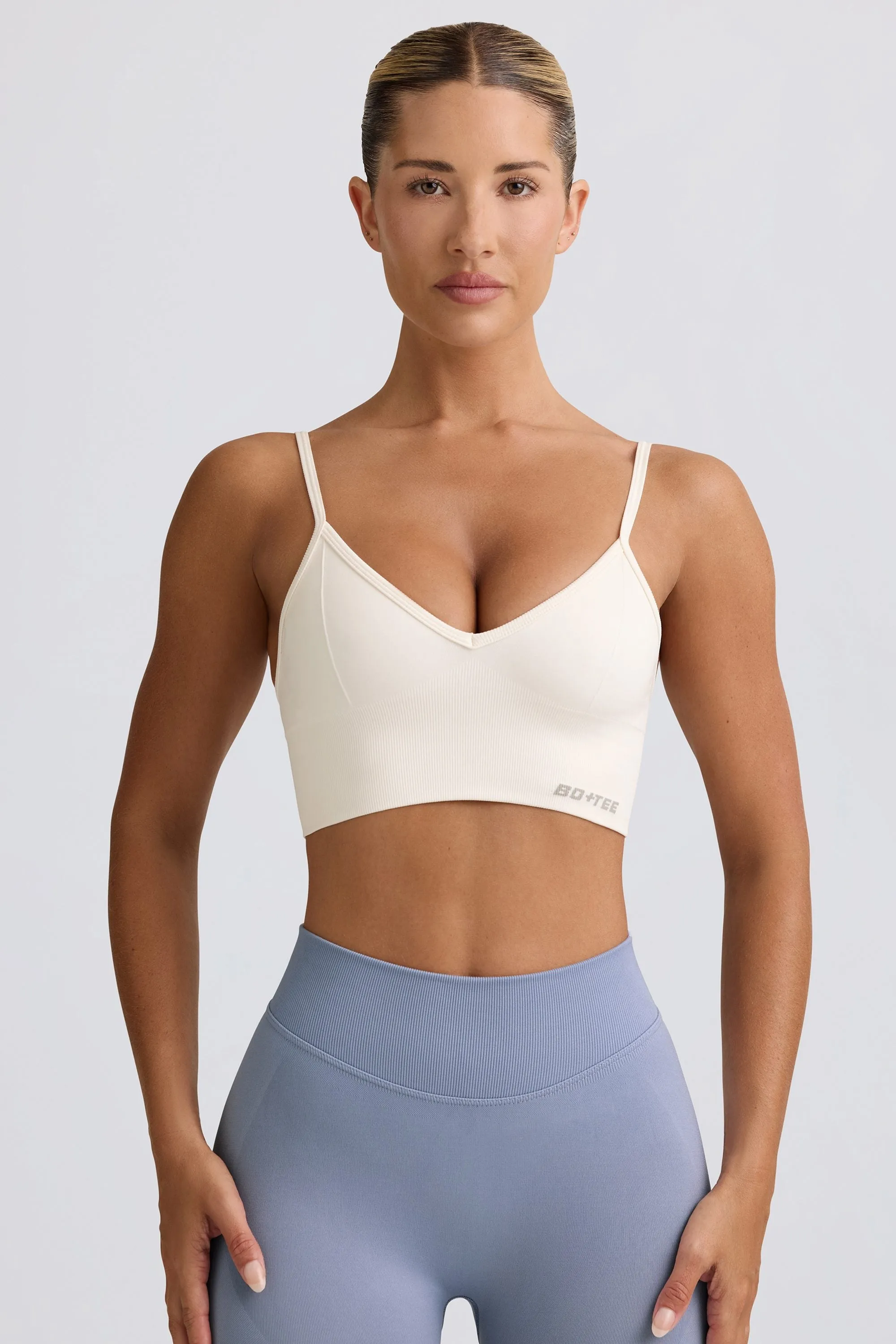 Define Luxe V-Neck Sports Bra in White sold by Bo + Tee product image thumbnail 5