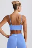 Define Luxe V-Neck Sports Bra in Light Blue sold by Bo + Tee