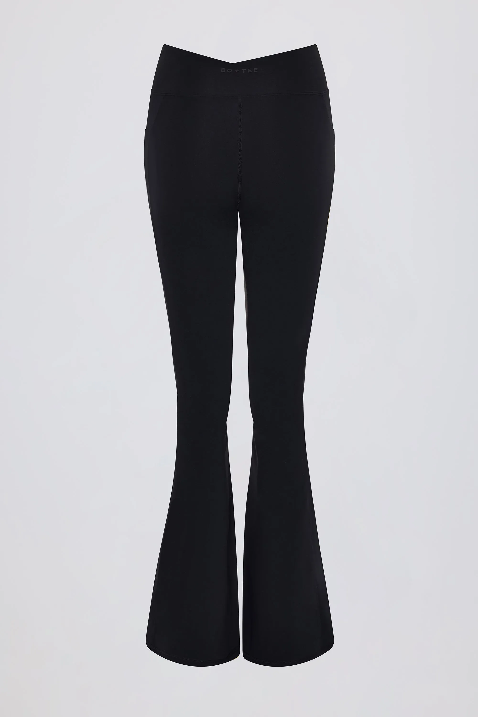 Soft Active V-Waist Pocket Flared Leggings in Black sold by Bo + Tee product image thumbnail 5