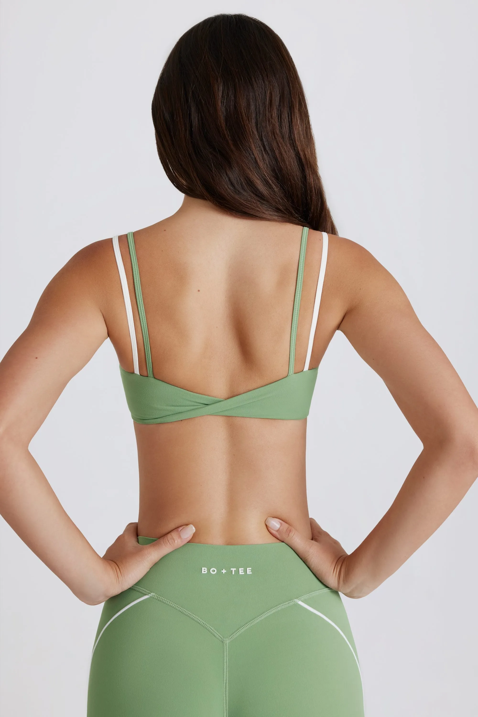 Soft Active Twist-Back Layered Sports Bra in Green sold by Bo + Tee product image thumbnail 2