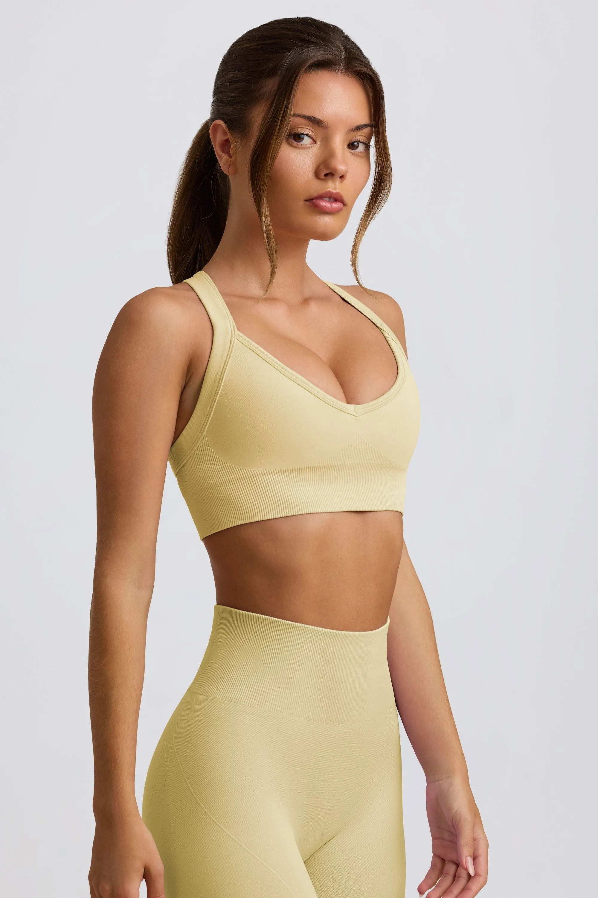 Super Sculpt Seamless Cross-Back Sports Bra in Butter Yellow sold by Bo + Tee product image thumbnail 5