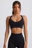 Super Sculpt Seamless Cross-Back Sports Bra in Black sold by Bo + Tee