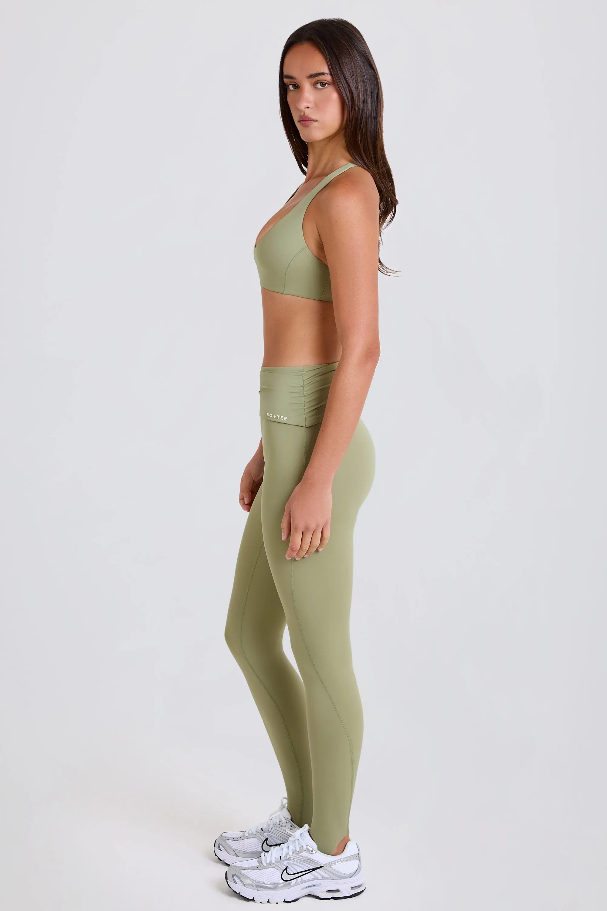 Four-Way Stretch Foldover Mid-Rise Stirrup Leggings in Matcha sold by Bo + Tee product image thumbnail 3