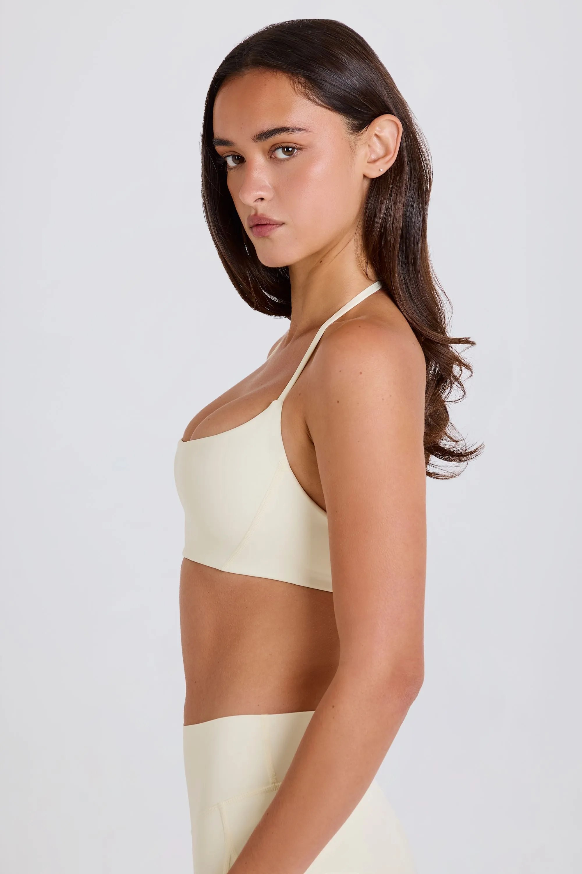 Four-Way Stretch Scoop-Neck Halterneck Sports Bra in Cream sold by Bo + Tee product image thumbnail 3
