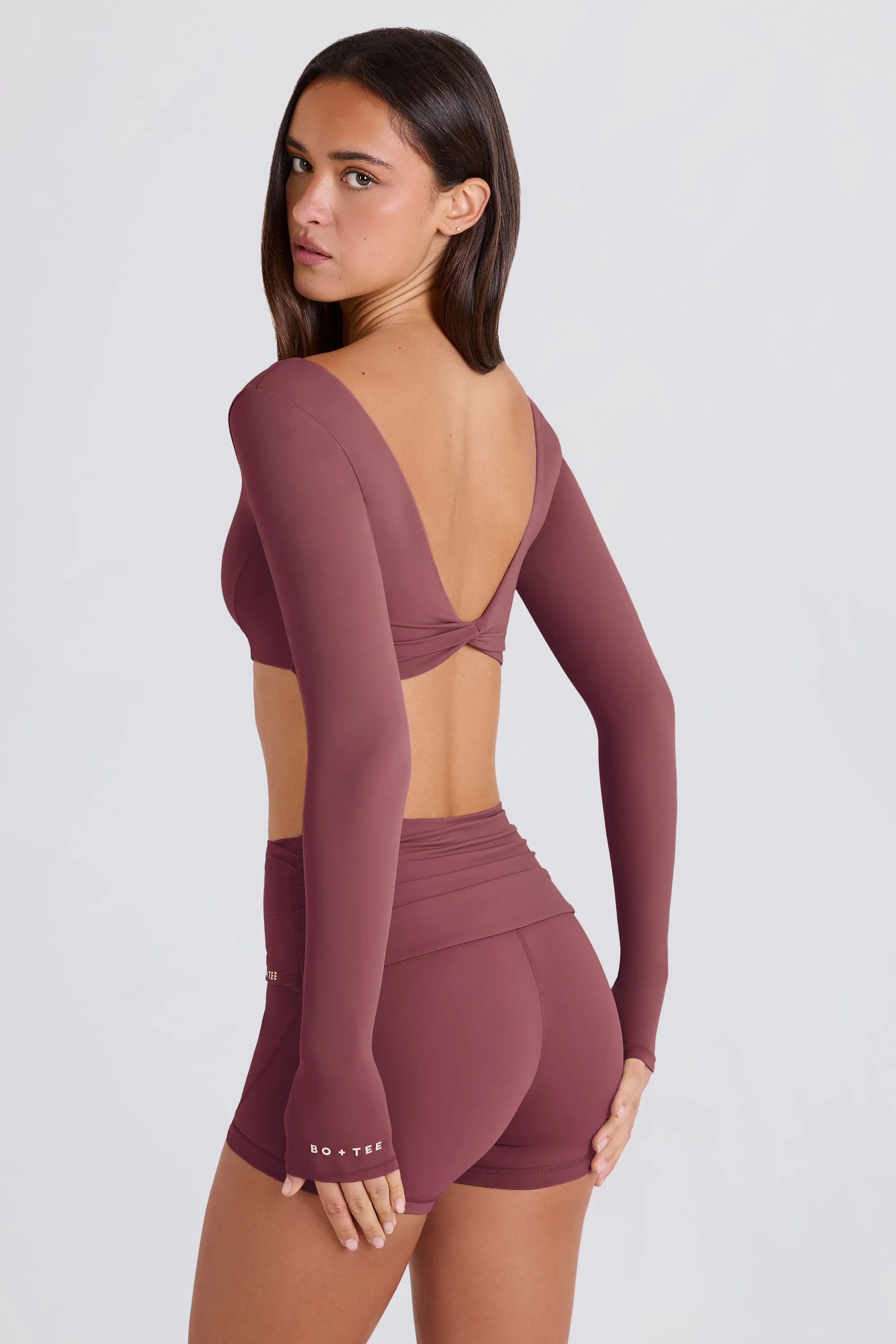 Four-Way Stretch Multiway Long-Sleeve Crop Top in Acai sold by Bo + Tee product image thumbnail 2