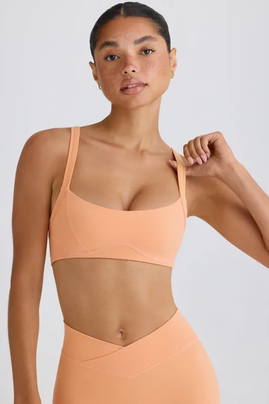 Soft Active Contrast-Trim Sports Bra in Peach sold by Bo + Tee