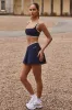 Soft Active Crossover Mini Skort in Classic Navy sold by Bo + Tee