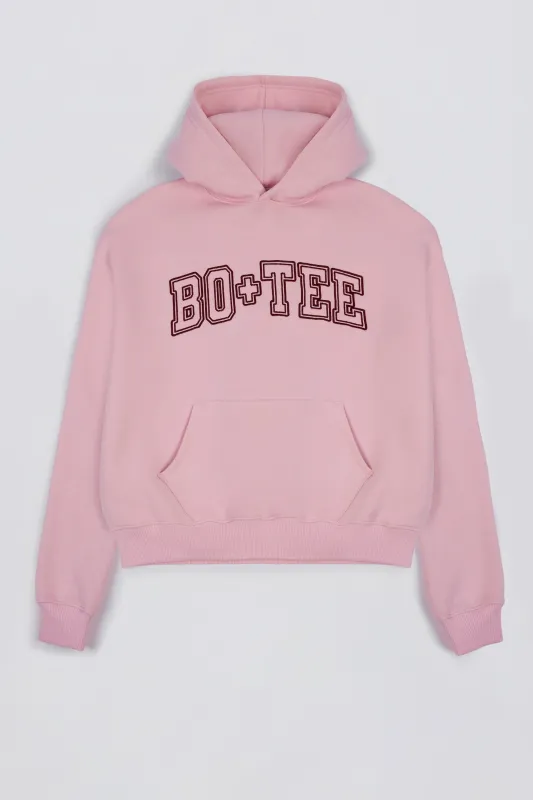 Oversized Appliqué Hoodie in Powder Pink sold by Bo + Tee
