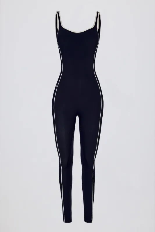 Soft Active Backless Contrast Jumpsuit in Classic Navy sold by Bo + Tee
