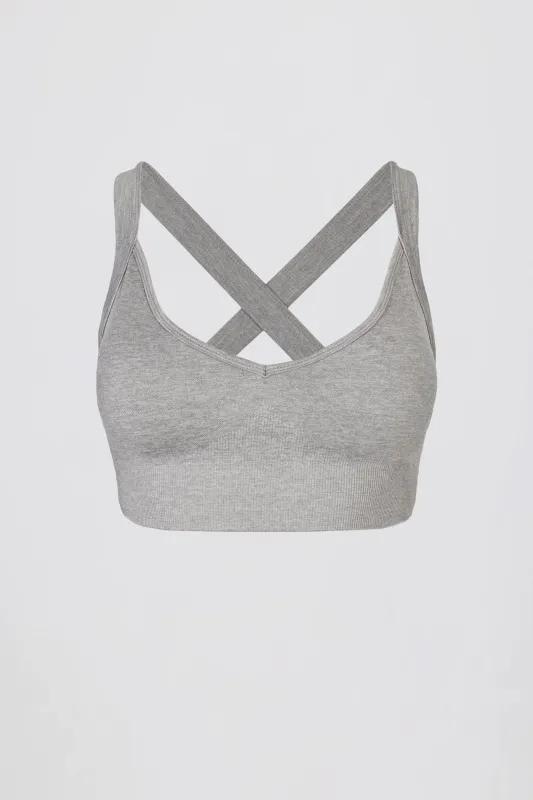 Super Sculpt Seamless Cross-Back Sports Bra in Grey Marl sold by Bo + Tee