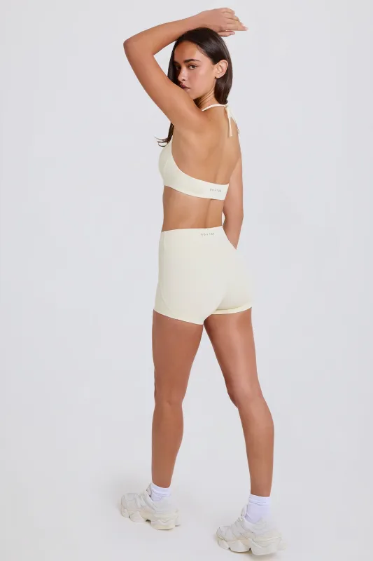 Four-Way Stretch High-Waist Mini Shorts in Cream sold by Bo + Tee