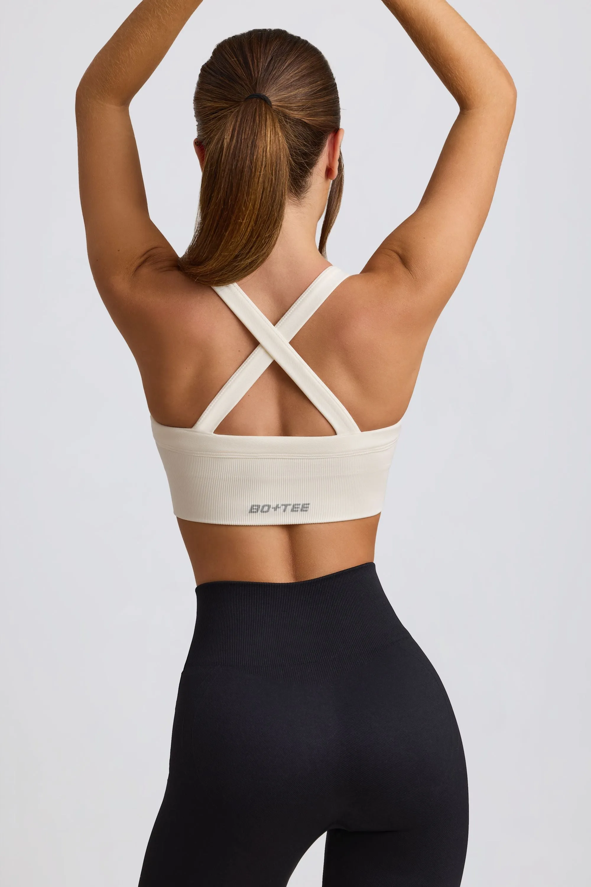Super Sculpt Seamless Cross-Back Sports Bra in White sold by Bo + Tee product image thumbnail 2