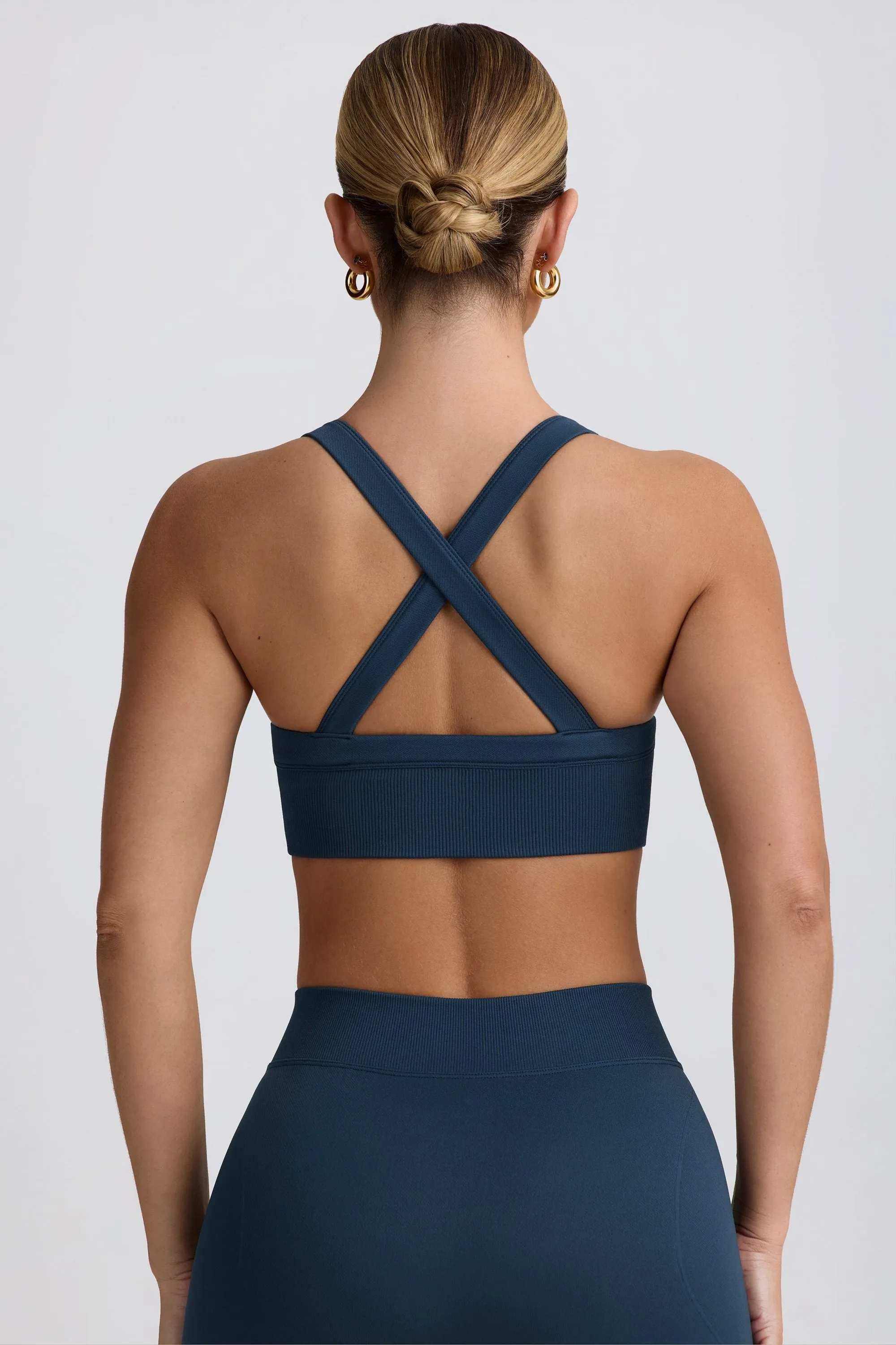 Super Sculpt Seamless Cross-Back Sports Bra in Blue sold by Bo + Tee product image thumbnail 4