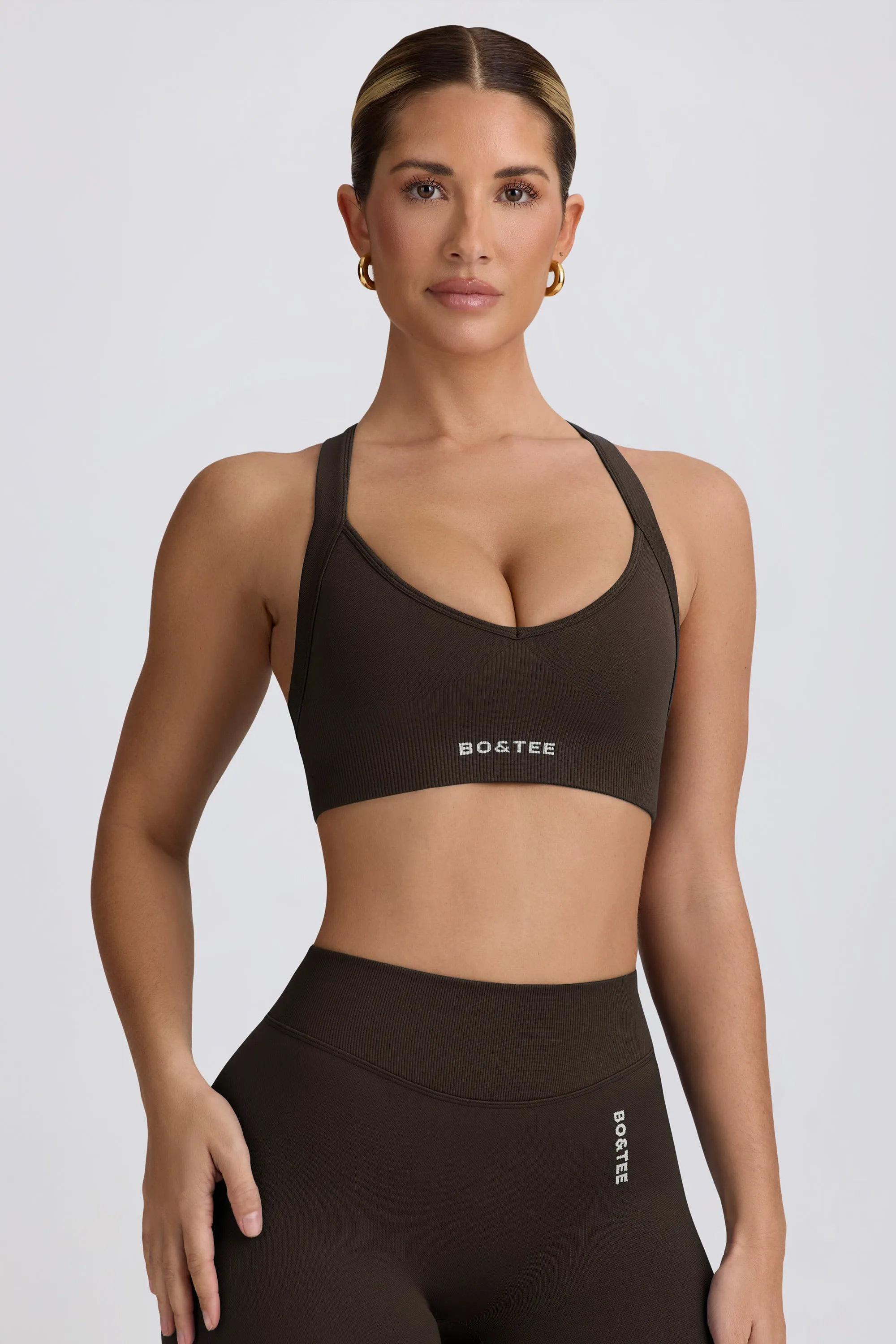 Super Sculpt Seamless Cross-Back Sports Bra in Brown sold by Bo + Tee product image thumbnail 5