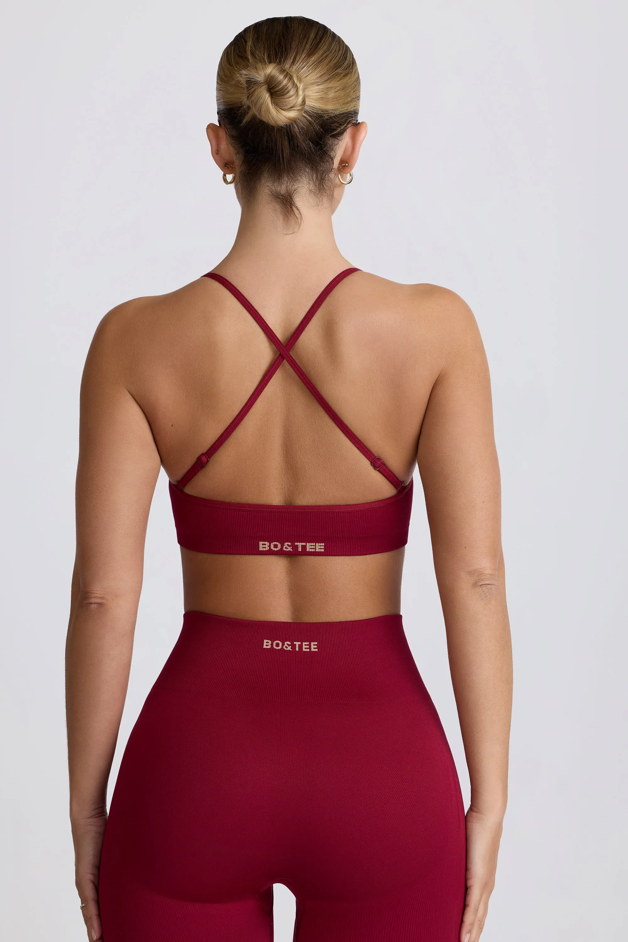 Super Sculpt Seamless Cross-Back Sports Bra in Burgundy sold by Bo + Tee product image thumbnail 3